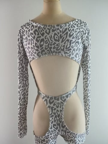 Leopard print long-sleeve top with cut-out design on a mannequin against a plain background